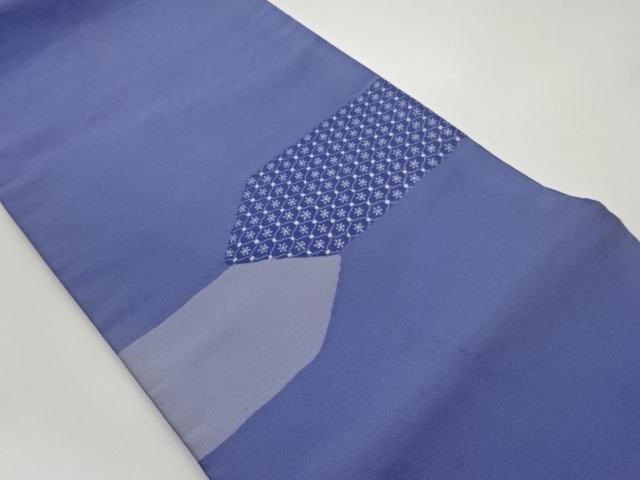 綴れ抽象菱に格子・花々模様織出し名古屋帯